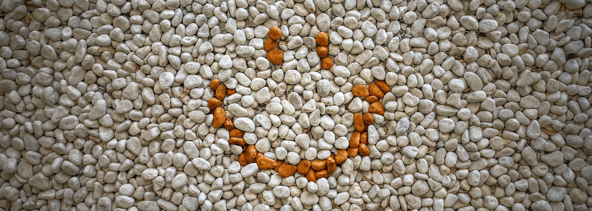 smiley face laid out in rocks