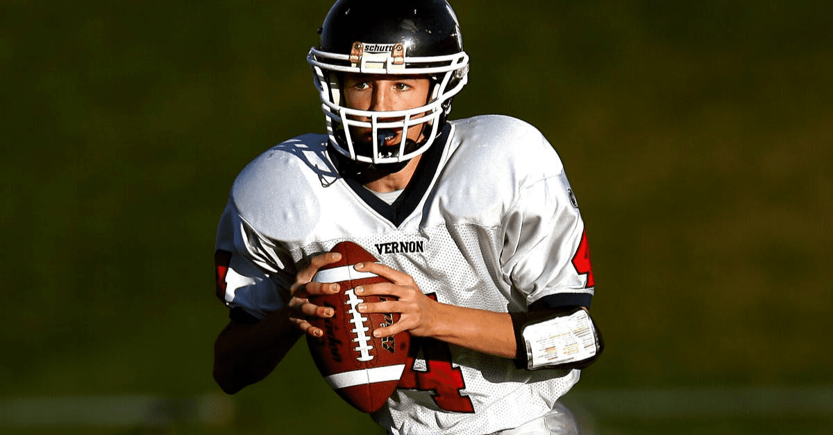 football player wearing a mouthguard with braces